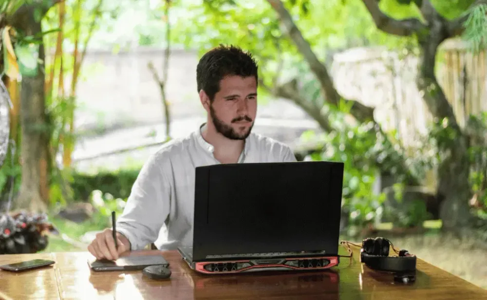 Digital nomad working on their computer in Indonesia